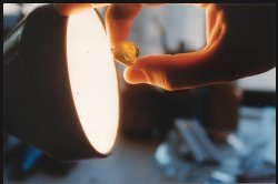 A piece of yellow sapphire in the rough.